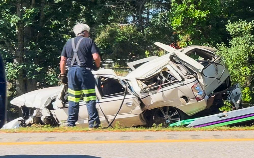 A crashed into a guardrail and rolled over into the median near mile marker 2.7 on Monday, July 13. Photo by David Curran