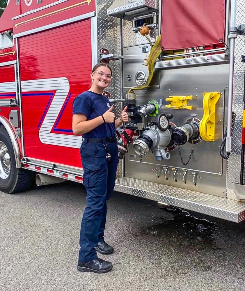 Jenna Klemp, 22, from Onset, is the first female full-time firefighter at Onset Fire Department. Photos source: Jenna Klemp