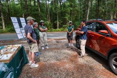 The BioBlitz group learns about insects with Plymouth County Entomologist Blake Dinius. Photo source: Tom Goetz