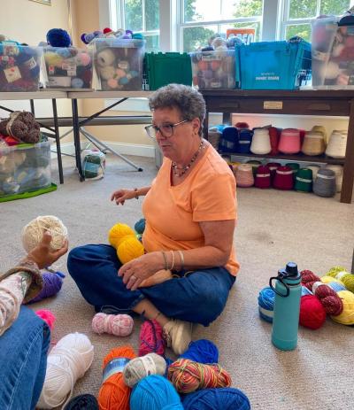 Donna Fox-Rubin categorizes and prices yarns. Photos by Sue Jackson