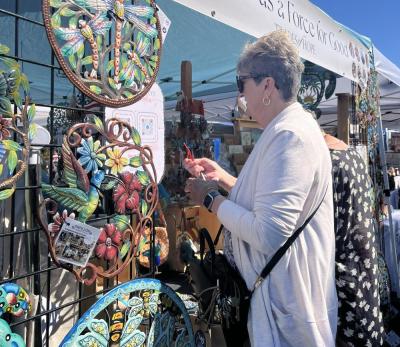 The fair had many artisan booths with handmade items. This booth included artistic items made from around the world.