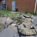 The pavement was battered at the store.