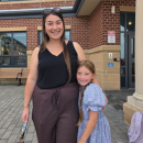 Sarah Estrella picks up her daughter at Wareham Elementary School after her first day. Photo by Tanvi Kulkarni