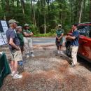 The BioBlitz group learns about insects with Plymouth County Entomologist Blake Dinius. Photo source: Tom Goetz