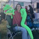 Elisa Campanini shows off her handmade dragon puppet.
