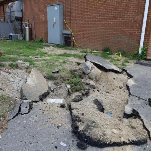 The pavement was battered at the store.