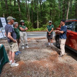 The BioBlitz group learns about insects with Plymouth County Entomologist Blake Dinius. Photo source: Tom Goetz
