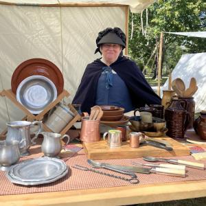 Lesley Pyron, part of the Rehoboth Militia, mans a booth in traditional clothing. “I love to dress up. We all make our own clothes mostly, so I find that entertaining for myself,” she said. “It's just an enjoyable hobby. It’s nice to see what people went through to give us the freedom we have.”