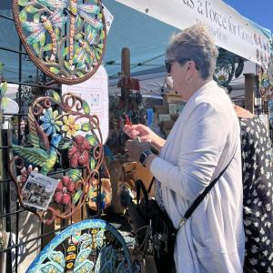 The fair had many artisan booths with handmade items. This booth included artistic items made from around the world.