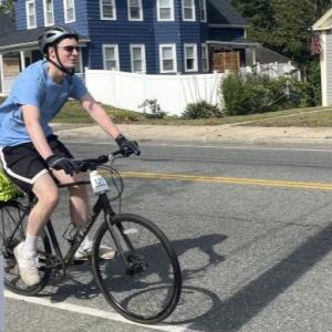 A rider cycles down Main Street. 