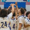 The Vikings celebrate their victory. Photos by Grace Roche